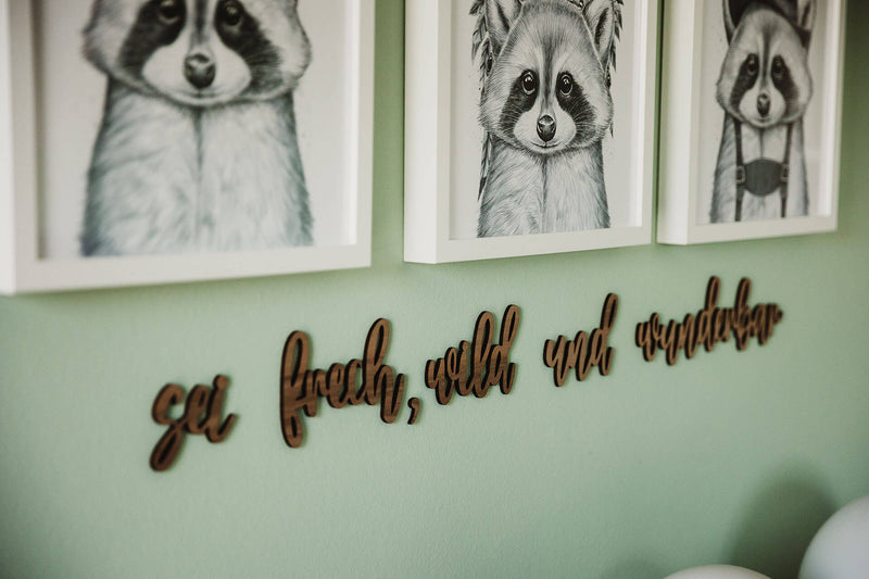Kinderzimmer Wand mit einem Holzspruch, "Sei frech, wild und wunderbar"